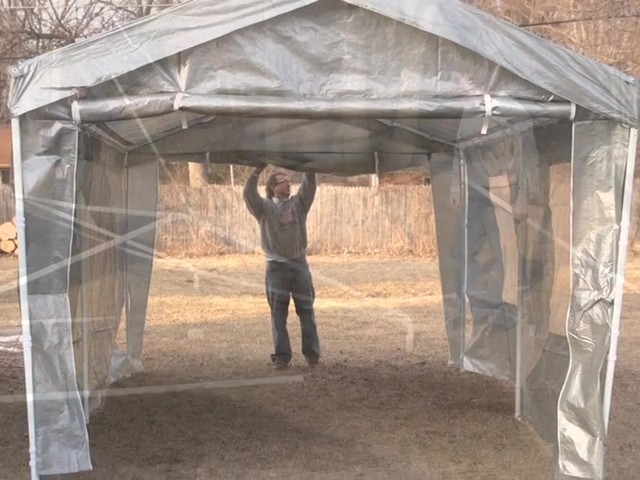Guide GearÂ® 10x20' Instant Shelter / Garage - image 3 from the video